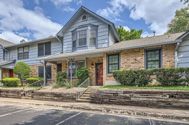 View of front of home featuring brick siding, unc