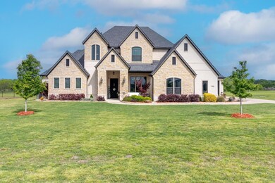 Fresh spring flowers and mulch makes this home truly move-in ready!