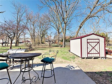 Spacious yard with storage shed