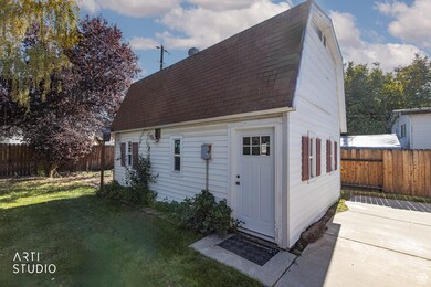 View of heated 16 x 24 workshop featuring a fenced backyard