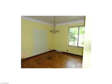 Dining room in front of house and near foyer area