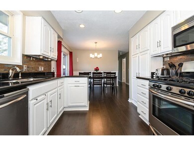 Spacious kitchen with granite counters and stainle