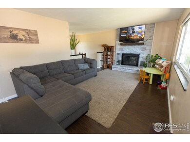 Large Livingroom with wood burning stove.
