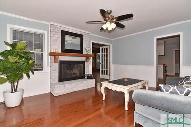Family Room - cozy brick fireplace (gas logs)