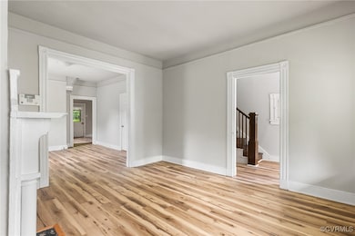Unfurnished room featuring light wood-style floors
