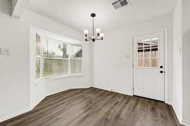 breakfast area open to living and kitchen