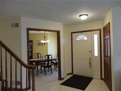 Fantastic entry with neutral ceramic tile flooring