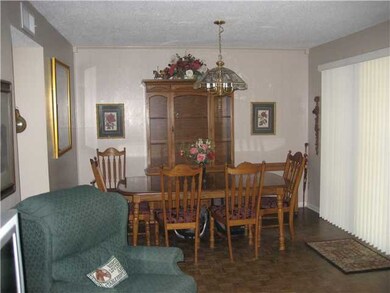 Dining area with hardwood floors and pretty view o