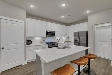 Kitchen with Island and double sink. Great breakfa