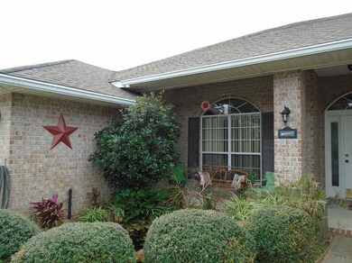 Koi pond behind scrubs