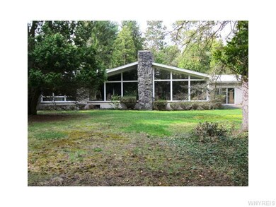 Exterior Back. View of back of house shows the wal