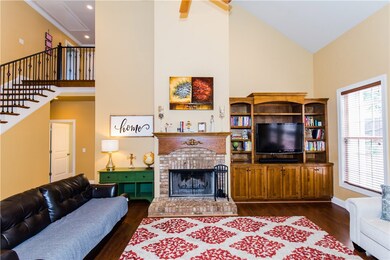 Great Room with built-ins and a wood-burning firep