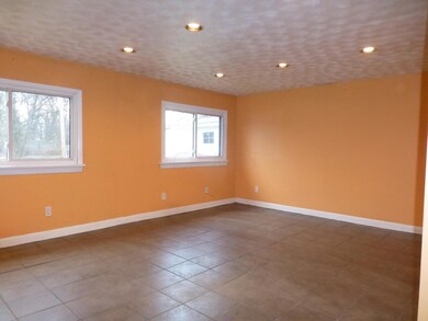 Family Room with Ceramic Tile Flooring