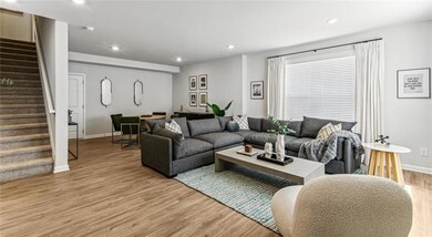 Living room featuring light hardwood / wood-style 