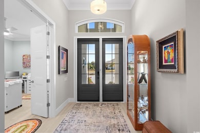 Foyer entrance featuring baseboards and light wood-style flooring