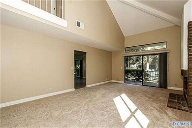 Very large and spacious living room with soaring v