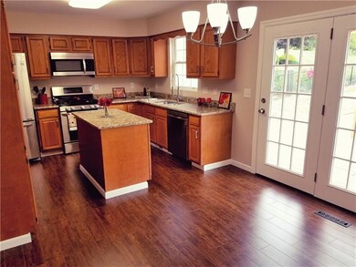 Eat in Kitchen that leads out to the in-ground poo
