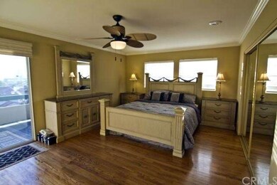 3rd level master bedroom with sliding glass doors 