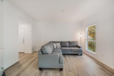 Living room featuring light wood-type flooring an