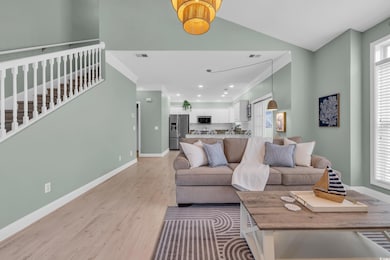 Living room with recessed lighting, visible vents,