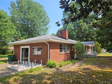 Rear view of property with a patio area