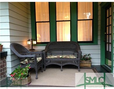 Porch. The front sitting porch and den bistro tabl