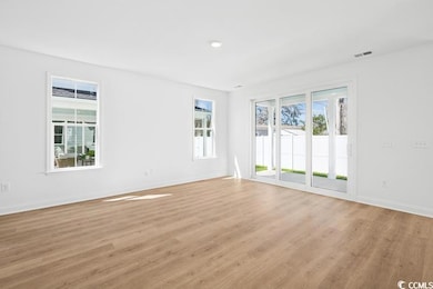 Spare room with light wood-style flooring, baseboa