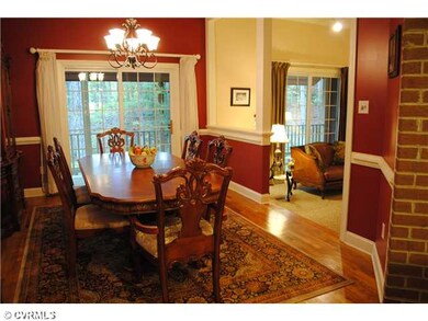 Dining Room - Hardwood floor, open to kitchen & li