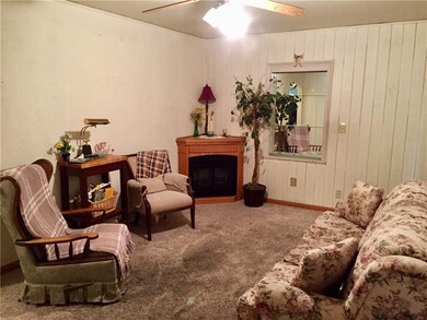 Cozy up in this 18x12 Living Room with an electric