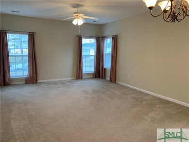 The large living room has space for a combination 