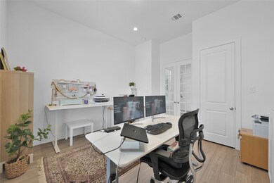 The office/study features glass french doors for a quiet work environment and a well sized closet to keep your supplies organized and out of sight.