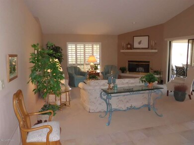 Living room w/ plantation shutters