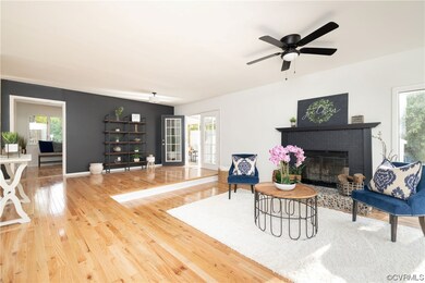 Sunlit Sunken Living Room with it's Open Concept