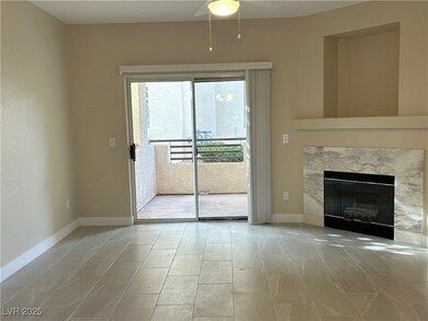 Unfurnished living room featuring baseboards, a ce