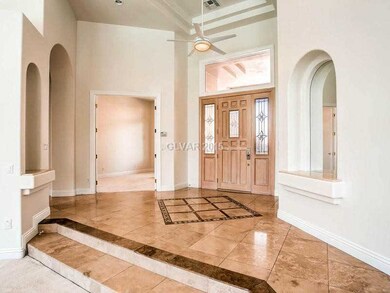 Living Room. Beautiful double doors provide entry