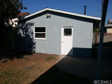 VIEW OF SIDE ENTRY TO OVERSIZED GARAGE WITH NEW WI