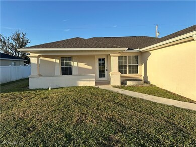 View of front of house with a front yard