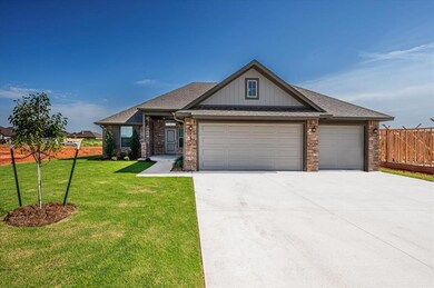 Craftsman-style home with a garage, driveway, brick siding, and roof with shingles