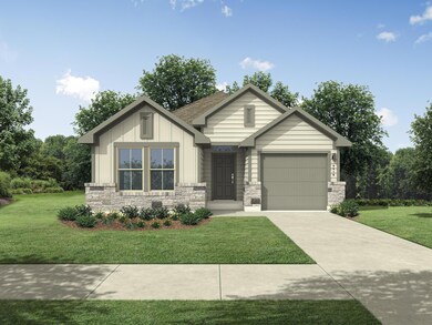 View of front of property with concrete driveway,
