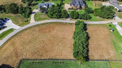 SMALL NEIGHBORHOOD WITH ONE 63 HOME SITES.