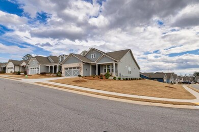 Craftsman-style home featuring a garage