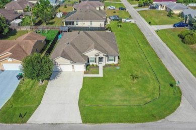 4074 SW Kamsler St, Port Saint Lucie, FL 34953 - photo 5