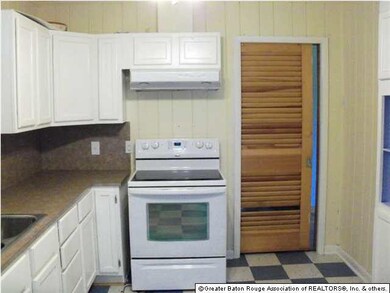 The kitchen is light and bright.