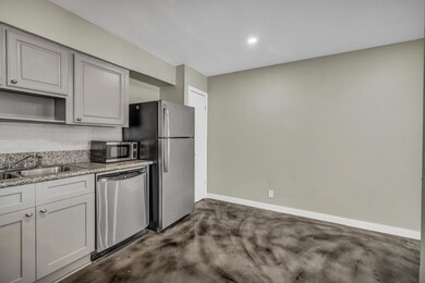 Kitchen featuring appliances with stainless steel
