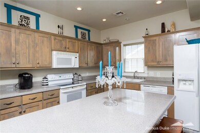 With the kitchen's island/bar, there is plenty of countertop space!