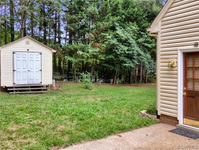 View of yard with a storage shed