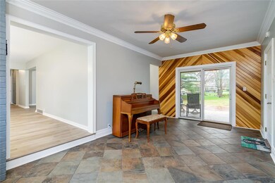 Bonus room offers plenty of space and a beautiful accent wall.