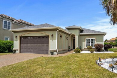 Mediterranean / spanish house with a front lawn, s