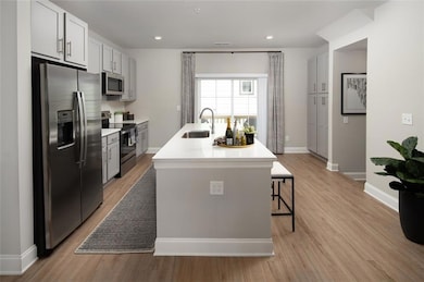 Kitchen with appliances with stainless steel finis
