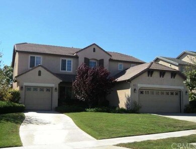 Dual Driveway With 3rd Car Garage 